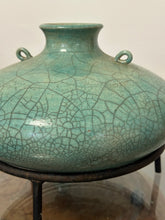 Load image into Gallery viewer, Mid Century Celadon Raku Crackle Amphora Vessel with Iron Stand