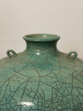 Load image into Gallery viewer, Mid Century Celadon Raku Crackle Amphora Vessel with Iron Stand
